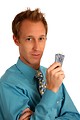 Free Stock Photo: A young businessman holding a pair of playing cards