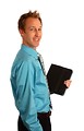 Free Stock Photo: A young businessman holding a binder