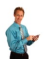 Free Stock Photo: A young businessman holding a calculator