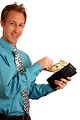 Free Stock Photo: A young businessman holding a wallet with money