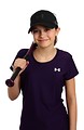 Free Stock Photo: A cute young girl posing with a softball bat