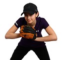 Free Stock Photo: A cute young girl posing with a softball mitt