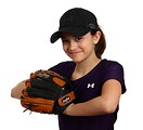 Free Stock Photo: A cute young girl posing with a softball mitt