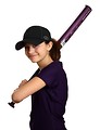 Free Stock Photo: A cute young girl posing with a softball bat