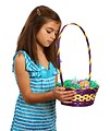 Free Stock Photo: A cute young girl holding an Easter basket