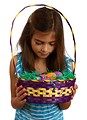 Free Stock Photo: A cute young girl holding an Easter basket