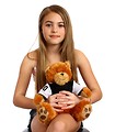 Free Stock Photo: A beautiful young girl holding a teddy bear
