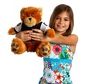 Free Stock Photo: A pretty young girl holding a teddy bear