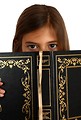 Free Stock Photo: A pretty young girl reading a book