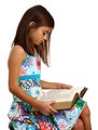 Free Stock Photo: A pretty young girl reading a book