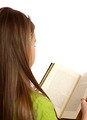 Free Stock Photo: A beautiful young girl reading a book