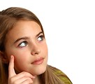 Free Stock Photo: A beautiful young girl with a thoughtful expression