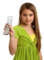 Free Stock Photo: A beautiful young girl holding a cell phone