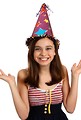 Free Stock Photo: A cute young girl wearing a birthday hat