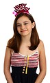 Free Stock Photo: A cute young girl wearing a happy birthday tiara
