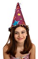 Free Stock Photo: A cute young girl wearing a birthday hat