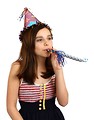 Free Stock Photo: A cute young girl wearing a birthday hat