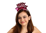 Free Stock Photo: A cute young girl wearing a happy birthday tiara