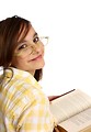Free Stock Photo: A smart girl with glasses reading a book
