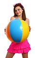 Free Stock Photo: A cute young girl posing with a beach ball
