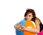 Free Stock Photo: A cute young girl posing with a beach ball