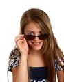 Free Stock Photo: A beautiful young girl posing with sunglasses
