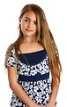 Free Stock Photo: A beautiful young girl posing with a white