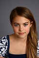 Free Stock Photo: A beautiful young girl posing with a gray background