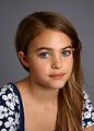 Free Stock Photo: A beautiful young girl posing with a gray background