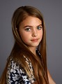 Free Stock Photo: A beautiful young girl posing with a gray background