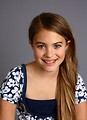 Free Stock Photo: A beautiful young girl posing with a gray background