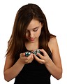 Free Stock Photo: A cute young girl opening a plastic easter egg