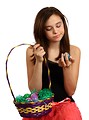 Free Stock Photo: A cute young girl holding an Easter basket