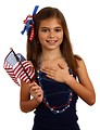 Free Stock Photo: A pretty young girl dressed for the 4th of July holding her hand on her heart