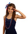 Free Stock Photo: A pretty young girl dressed for the 4th of July giving a salute