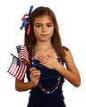 Free Stock Photo: A pretty young girl dressed for the 4th of July holding her hand on her heart