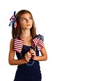 Free Stock Photo: A pretty young girl dressed for the 4th of July holding small American flags