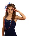 Free Stock Photo: A pretty young girl dressed for the 4th of July giving a salute