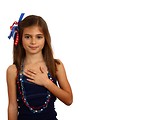 Free Stock Photo: A pretty young girl dressed for the 4th of July holding her hand on her heart