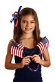 Free Stock Photo: A pretty young girl dressed for the 4th of July holding small American flags