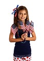Free Stock Photo: A pretty young girl dressed for the 4th of July holding small American flags