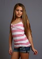 Free Stock Photo: A beautiful young girl posing on a gray background