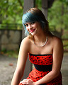 Free Stock Photo: A beautiful young woman posing in a red dress