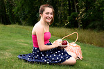 Free Stock Photo: A beautiful young girl having a picnic in the grass