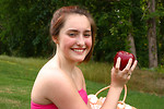 Free Stock Photo: A beautiful young girl having a picnic in the grass