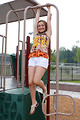 Free Stock Photo: A beautiful young girl playing on a playground