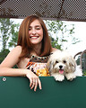 Free Stock Photo: A beautiful young girl playing on a playground with a dog