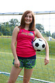 Free Stock Photo: A cute young girl posing with a soccer ball