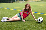 Free Stock Photo: A cute young girl posing with a soccer ball