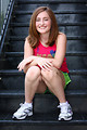 Free Stock Photo: A cute young girl posing on stairs